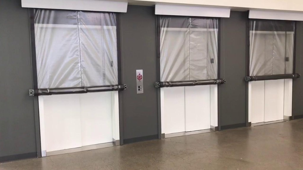 Should Elevator Smoke Curtains Drop Floor by Floor or All at Once?
